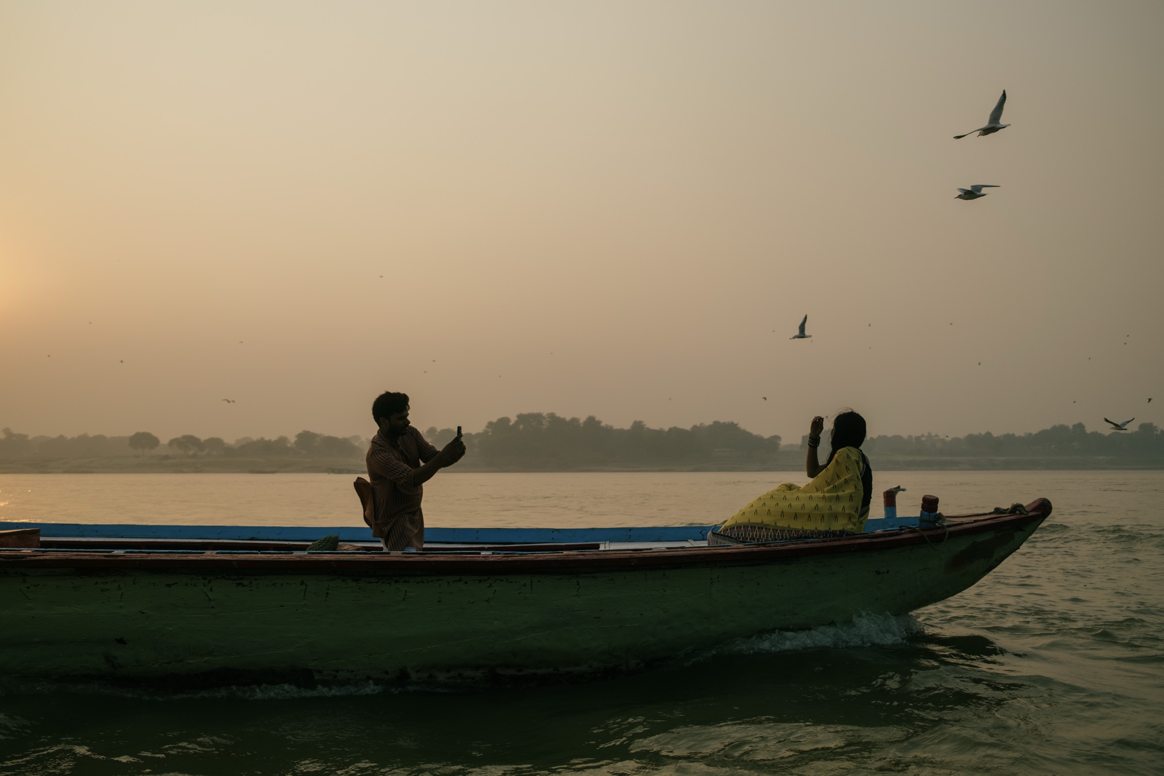 Boat at sunrise on the Ganges